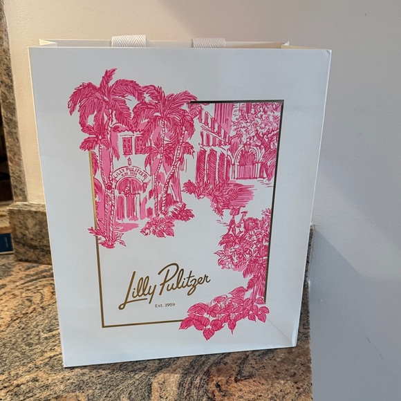 Lilly Pulitzer Handbags - Lilly Pulitzer gift shopping bag. No defects. Used 1x to bring home purchase.